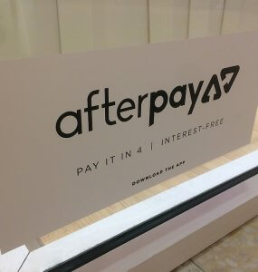 afterpay advertisement on shop window