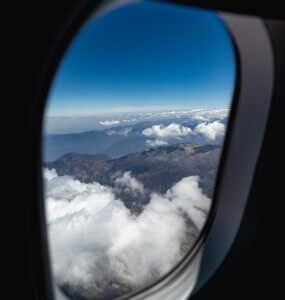 plane in flight showing window view